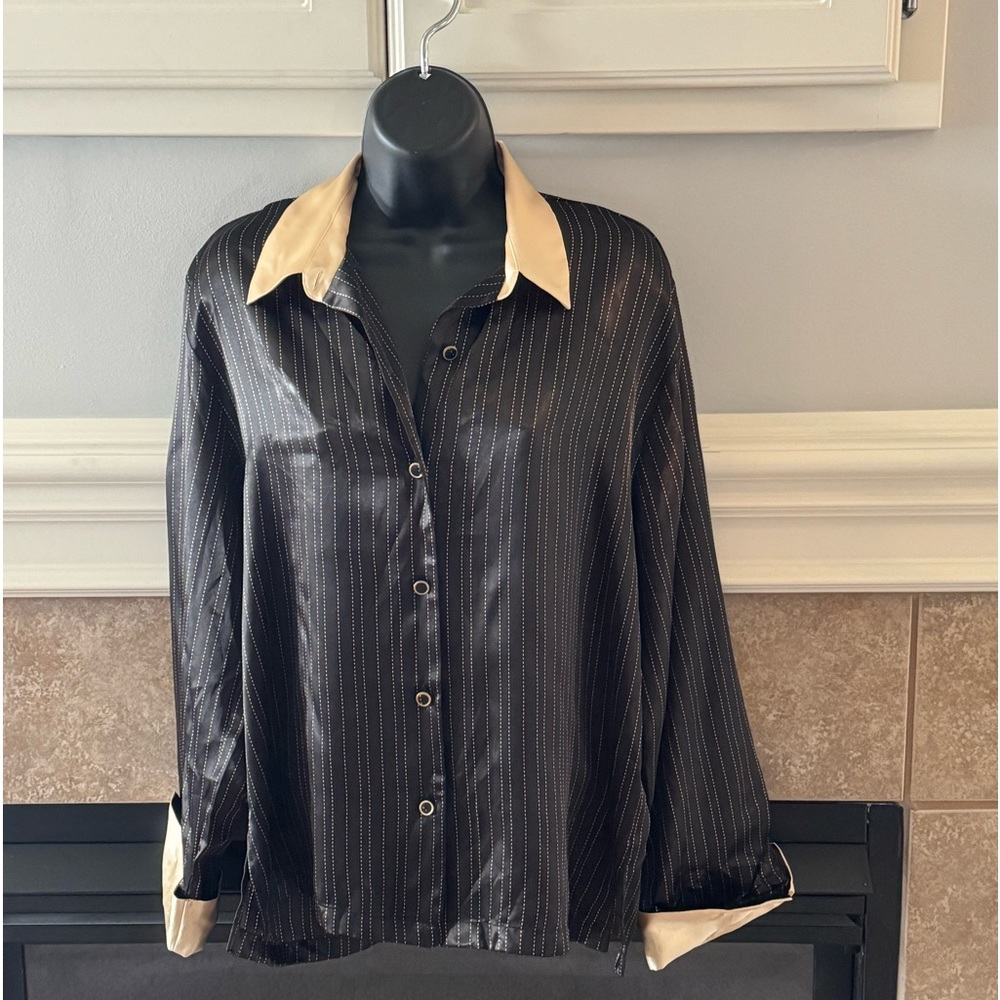 Silky and sleek long sleeved button up.